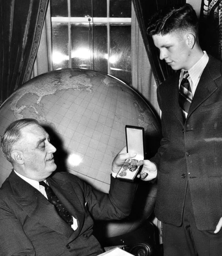 President F. D. Roosevelt presents the Medal of Honor to Kenneth N. Walker, Jr.